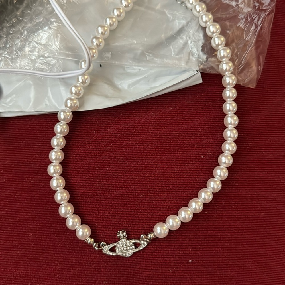 Orbit pearl necklace new